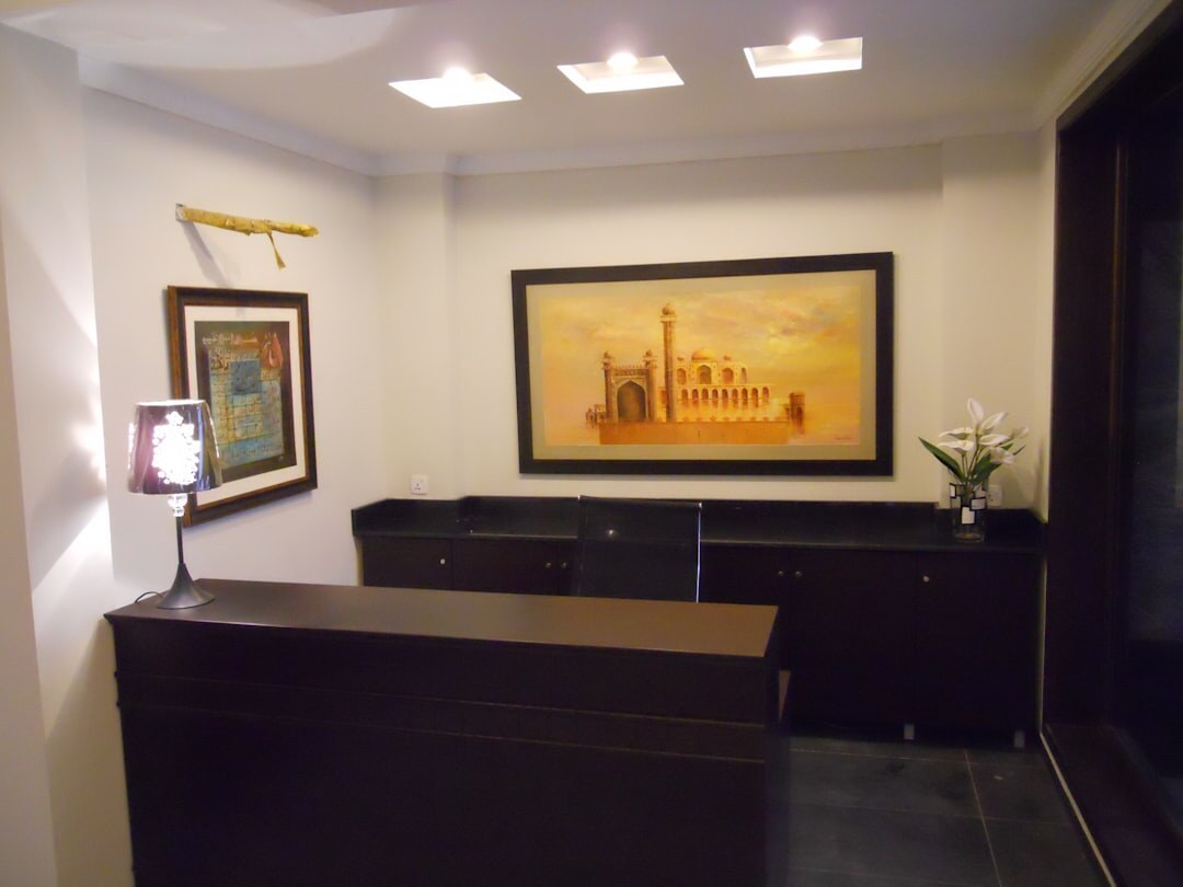 Elegant office reception with marble and brass details
